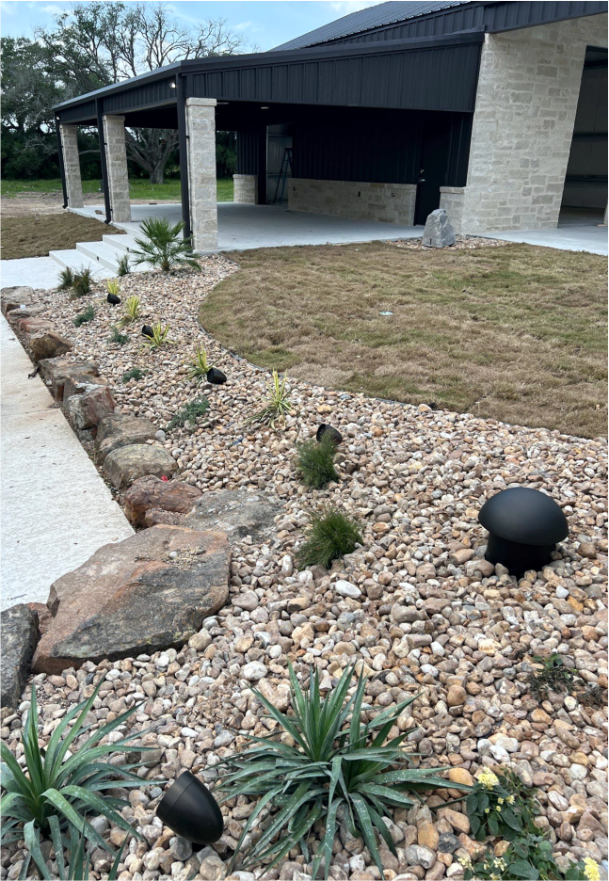 Outdoor landscape with pathway lighting installation