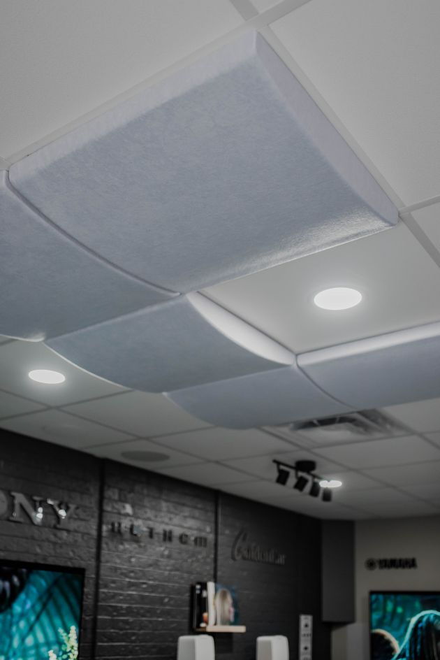 Gray acoustic wall panels with spotlight