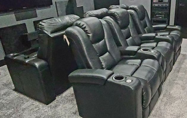 Black leather recliners in home theater
