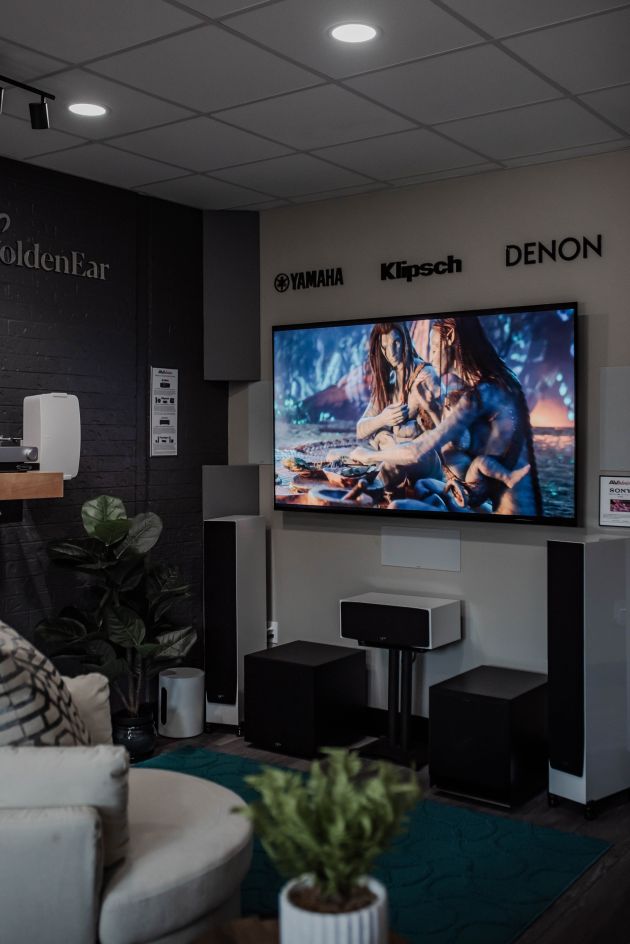 Home theater display with Yamaha and Denon setup