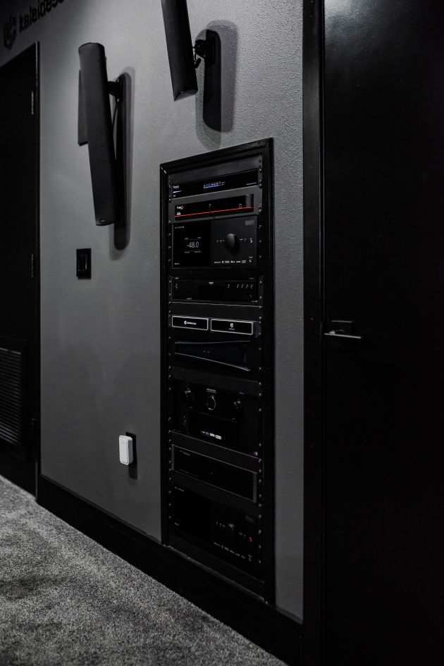 Built-in AV equipment rack in theater room